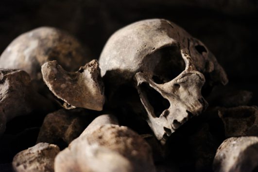 Early Christianity Tour or St Sebastian with Catacombs Tour - Skulls from Christian Catacombs