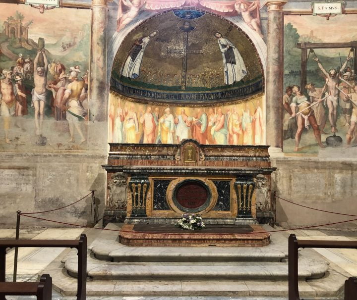 Altar frescoes depicting Roman martyrs tour at St Stephen in the Round Basilica Rome