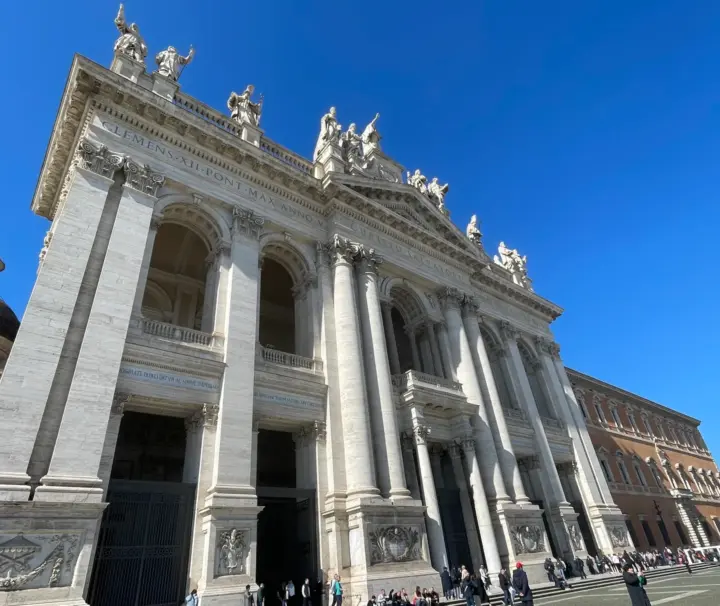 St John Lateran & Holy Stairs Tour 12 Facade of St John Lateran under a blue sky, Rome