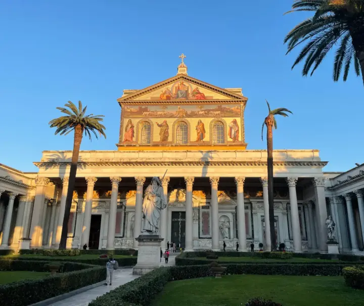 St Paul’s Tomb Tour 13 Sunlit facade and courtyard of St Paul Outside the Walls, Rome