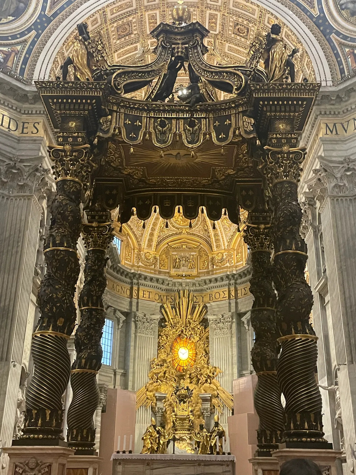 Bernini’s baldachin and the Chair of Saint Peter beyond it in St Peter’s Basilica, Vatican City