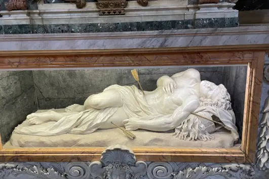 Reclining statue of St Sebastian in San Sebastiano fuori le Mura, Rome